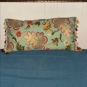 Rectangular throw pillow with tassled ends-floral pattern in green/yellow/red